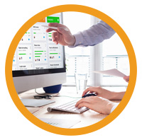 a man explaining the chart on the desktop screen