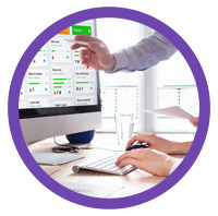 a man explaining the chart on the desktop screen