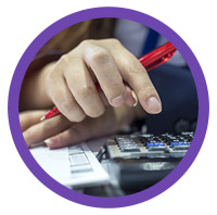 lady operating a calculator