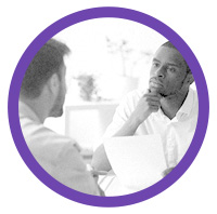A man interviewing a person