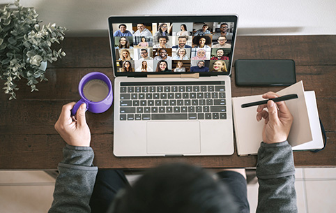 a lady attending an online meeting