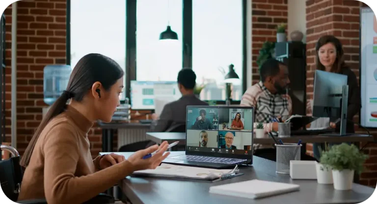 A lady attending a webinar on laptop